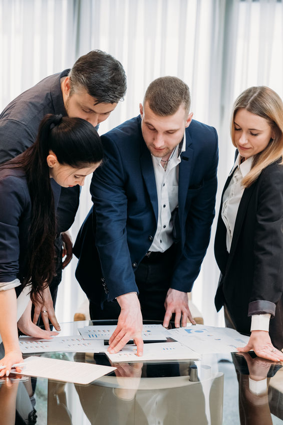 People around meeting table