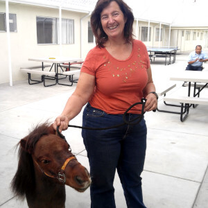 A woman and a pony